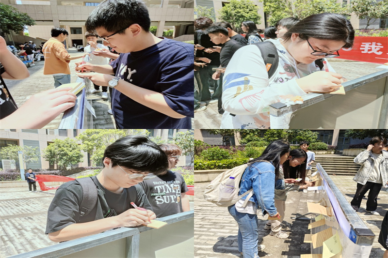 图为学生在便利贴上书写.jpg